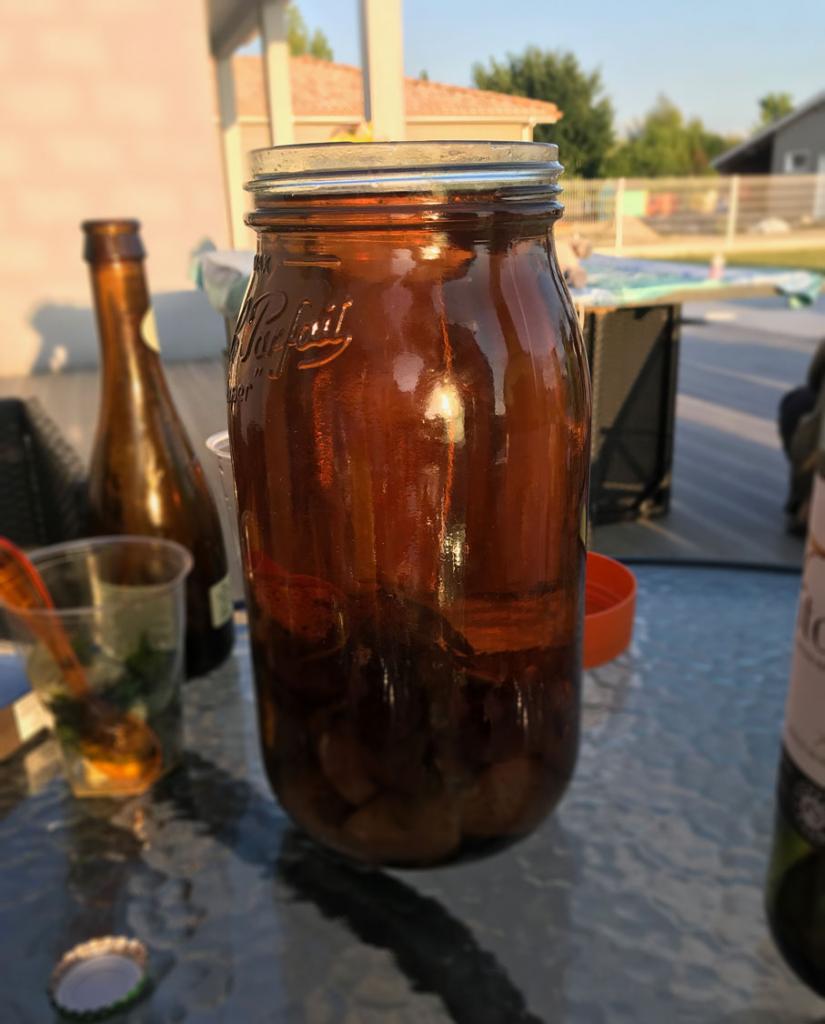 A bottle of Caramel arranged rum